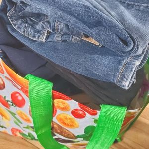Grocery bag full of sm/m woman's clothes